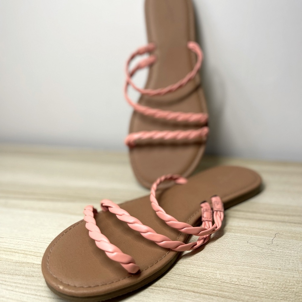 Pink strapped tan slides
